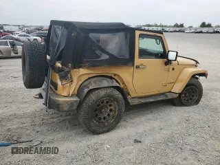 2014 Jeep Wrangler Sahara with VIN 1C4AJWBG8EL144691, listed as a Copart auction lot 71172514 with 111,322 mi miles and Salvage title. Bid and sale history available at DreamBid. Image 3.