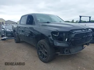 2023 Ram 1500 Laramie with VIN 1C6SRFJT0PN541645, listed as a IAAI auction lot 42682307 with 64,180 mi miles and . Bid and sale history available at DreamBid. Image 1.