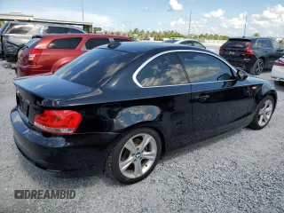 2012 BMW 1 Series 128i with VIN WBAUP7C56CVP23806, listed as a Copart auction lot 62339235 with 105,776 mi miles and Salvage title. Bid and sale history available at DreamBid. Image 3.