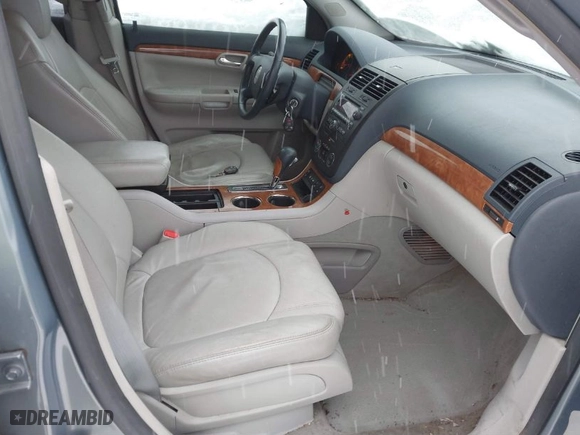 2007 Saturn Outlook XR with VIN 5GZER33717J173535, listed as a IAAI auction lot 41282494 with 122,987 mi miles. Bid and sale history available at carsss.com. Image 5.
