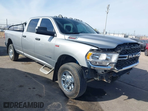 2021 Ram 2500 Tradesman with VIN 3C6UR5HJ9MG610232, listed as a IAAI auction lot 41072104 with 22,196 mi miles and . Bid and sale history available at DreamBid. Image 1.