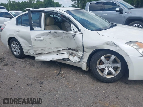 2009 Nissan Altima S z VIN 1N4AL21E39N471549, wystawiony jako IAAI lot #42203365 z przebiegiem 197 775 mil mil oraz . Historia ofert i sprzedaży dostępna na DreamBid. Obrazek 6.