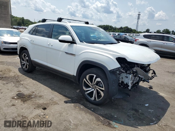 2023 Volkswagen Atlas SEL with VIN 1V2BE2CA4PC216788, listed as a Copart auction lot 65115764 with 13,033 mi miles and Salvage title. Bid and sale history available at DreamBid. Image 4.