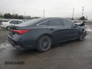 2019 Toyota Avalon Limited Hybrid z VIN 4T1B21FB2KU005290, wystawiony jako Copart lot #87433804 z przebiegiem 92 909 mil mil oraz Szkoda całkowita • Salvage title. Historia ofert i sprzedaży dostępna na DreamBid. Obrazek 3.