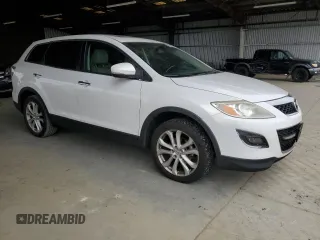 2012 Mazda CX-9 Grand Touring with VIN JM3TB3DV2C0336355, listed as a Copart auction lot 61687975 with 150,580 mi miles and Salvage title. Bid and sale history available at DreamBid. Image 4.