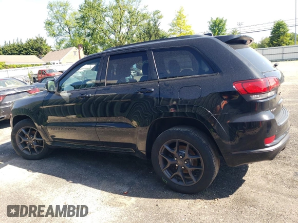 2019 Jeep Grand Cherokee Limited with VIN 1C4RJFBGXKC843402, listed as a Copart auction lot 57148265 with 96,615 mi miles and Salvage title. Bid and sale history available at DreamBid. Image 2.