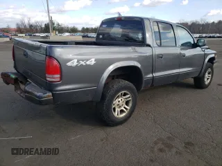 2004 Dodge Dakota Sport z VIN 1D7HG38N64S688604, wystawiony jako Copart lot #79811934 z przebiegiem 160 377 mil mil oraz Szkoda całkowita • Salvage title. Historia ofert i sprzedaży dostępna na DreamBid. Obrazek 3.