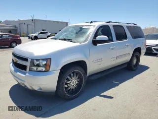 2013 Chevrolet Suburban LT with VIN 1GNSCJE09DR105725, listed as a Copart auction lot 61450935 with 171,659 mi miles and Salvage title. Bid and sale history available at DreamBid. Image 1.