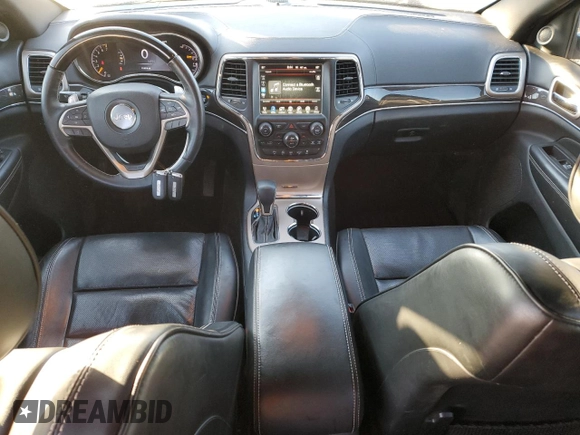 2017 Jeep Grand Cherokee Overland with VIN 1C4RJFCG3HC675125, listed as a Copart auction lot 50142865 with 113,819 mi miles and Salvage Title. Bid and sale history available at carsss.com. Image 8.