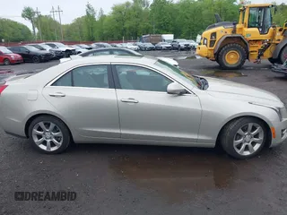 2015 Cadillac ATS Luxury RWD z VIN 1G6AB5RX8F0101942, wystawiony jako IAAI lot #42199906 z przebiegiem 58 627 mil mil oraz . Historia ofert i sprzedaży dostępna na DreamBid. Obrazek 13.