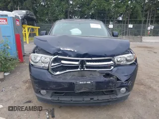 2013 Dodge Durango SXT with VIN 1C4RDJAG5DC697022, listed as a IAAI auction lot 42474060 with 159,723 mi miles and . Bid and sale history available at DreamBid. Image 12.