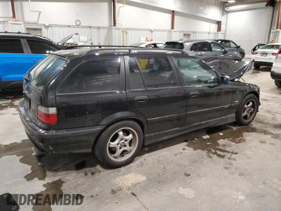 1997 BMW M3 with VIN WBACE11020EZ24250, listed as a Copart auction lot 85107784 with 147,369 mi miles and Clean title. Bid and sale history available at DreamBid. Image 3.