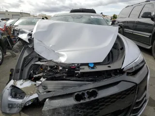 2022 Audi e-tron GT Prestige z VIN WAUEJBFW0N7006385, wystawiony jako Copart lot #70174293 z przebiegiem 24 376 mil mil oraz . Historia ofert i sprzedaży dostępna na DreamBid. Obrazek 5.