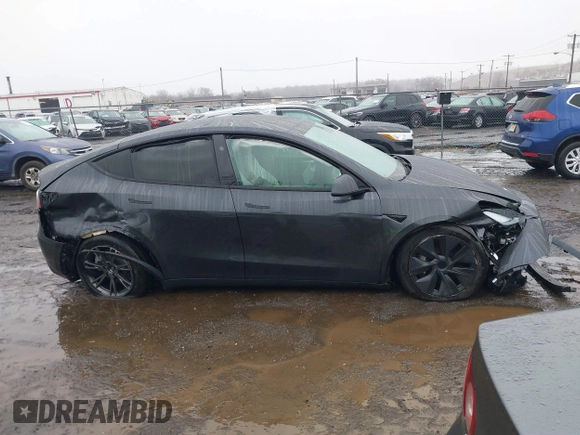 2025 Tesla Model Y Long Range with VIN 7SAYGDED6SF226035, listed as a IAAI auction lot 41102115 with Not Provided miles and . Bid and sale history available at DreamBid. Image 13.