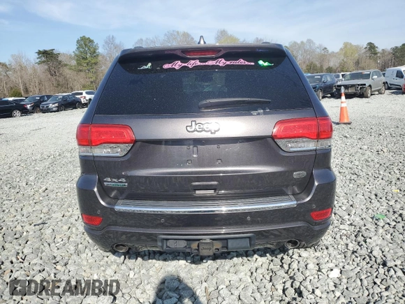 2015 Jeep Grand Cherokee Overland with VIN 1C4RJFCMXFC237723, listed as a Copart auction lot 50318145 with 103,741 mi miles and Salvage title. Bid and sale history available at DreamBid. Image 6.