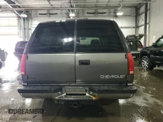 1999 Chevrolet Suburban with VIN 3GNFK16R8XG149091, listed as a Copart auction lot 71300024 with 254,044 mi miles and Salvage Title. Bid and sale history available at carsss.com. Image 6.