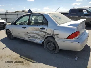 2003 Mitsubishi Lancer ES with VIN JA3AJ26E73U062975, listed as a Copart auction lot 71619374 with 242,550 mi miles and Salvage Title. Bid and sale history available at carsss.com. Image 2.