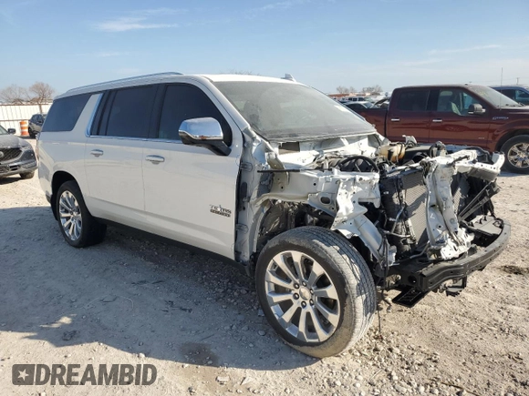 2023 Chevrolet Suburban Premier with VIN 1GNSCFKD2PR106790, listed as a Copart auction lot 46873635 with 31,972 mi miles and Salvage title. Bid and sale history available at DreamBid. Image 4.
