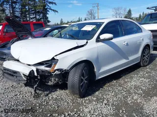 2017 Volkswagen Jetta 1.4T SE with VIN 3VWDB7AJXHM325773, listed as a IAAI auction lot 41691782 with 172,273 mi miles. Bid and sale history available at carsss.com. Image 2.