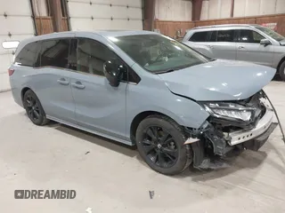 2023 Honda Odyssey Sport z VIN 5FNRL6H77PB003489, wystawiony jako IAAI lot #41952001 z przebiegiem 22 860 mil mil oraz . Historia ofert i sprzedaży dostępna na DreamBid. Obrazek 1.