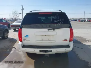 2011 GMC Yukon SLT with VIN 1GKS2CE03BR397395, listed as a IAAI auction lot 41813501 with 220,443 mi miles. Bid and sale history available at carsss.com. Image 16.