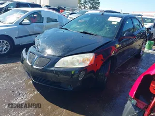 2005 Pontiac G6 GT with VIN 1G2ZH548154165427, listed as a IAAI auction lot 41650622 with 149,187 mi miles. Bid and sale history available at carsss.com. Image 17.