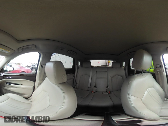2016 Cadillac SRX Luxury Collection z VIN 3GYFNBE33GS507014, wystawiony jako IAAI lot #41979980 z przebiegiem 115 077 mil mil oraz . Historia ofert i sprzedaży dostępna na DreamBid. Obrazek 19.