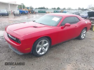 2013 Dodge Challenger R/T with VIN 2C3CDYBT5DH588006, listed as a IAAI auction lot 41858679 with 160,911 mi miles. Bid and sale history available at carsss.com. Image 17.