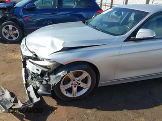 2014 BMW 3 Series 320i with VIN WBA3B1G58ENS81101, listed as a IAAI auction lot 38950717 with 1 mi miles. Bid and sale history available at carsss.com. Image 6.