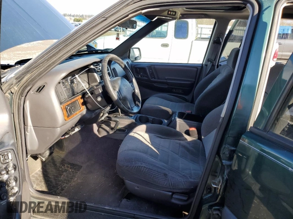 1996 Jeep Grand Cherokee Laredo with VIN 1J4GZ58S0TC245935, listed as a Copart auction lot 44782555 with 268,742 mi miles and Salvage Title. Bid and sale history available at carsss.com. Image 7.