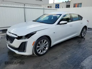 2023 Cadillac CT5 Premium Luxury z VIN 1G6DN5RK5P0132088, wystawiony jako Copart lot #44972315 z przebiegiem 28 349 mil mil oraz Czysty tytuł • Clean title. Historia ofert i sprzedaży dostępna na DreamBid. Obrazek 1.