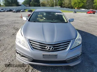 2015 Hyundai Azera z VIN KMHFG4JGXFA483472, wystawiony jako Copart lot #52216745 z przebiegiem 130 758 mil mil oraz Szkoda całkowita • Salvage title. Historia ofert i sprzedaży dostępna na DreamBid. Obrazek 5.
