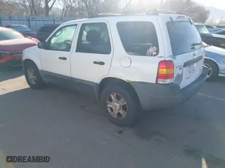 2003 Ford Escape XLT Popular with VIN 1FMYU03193KC46125, listed as a IAAI auction lot 41752254 with 186,929 mi miles. Bid and sale history available at carsss.com. Image 3.