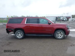 2020 Chevrolet Suburban LT with VIN 1GNSKHKC9LR233603, listed as a IAAI auction lot 41311582 with 104,754 mi miles. Bid and sale history available at carsss.com. Image 13.