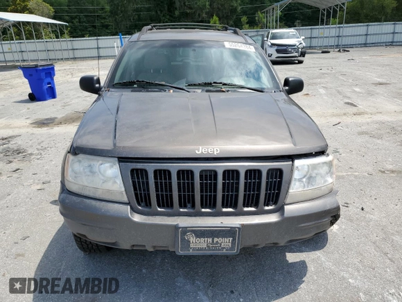 1999 Jeep Grand Cherokee Limited with VIN 1J4GW68S6XC713297, listed as a Copart auction lot 55264384 with 98,912 mi miles and Salvage Title. Bid and sale history available at carsss.com. Image 5.