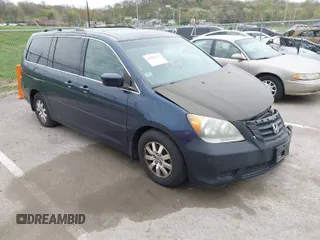 2009 Honda Odyssey EX-L with VIN 5FNRL38769B409281, listed as a IAAI auction lot 42013137 with 213,934 mi miles. Bid and sale history available at carsss.com. Image 1.