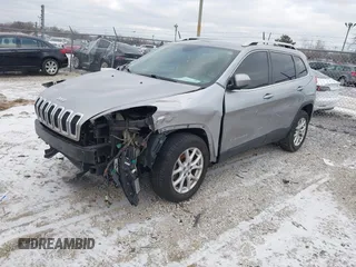 2016 Jeep Cherokee 75th Anniversary with VIN 1C4PJLCB1GW297555, listed as a IAAI auction lot 41232269 with 257,033 mi miles. Bid and sale history available at carsss.com. Image 2.