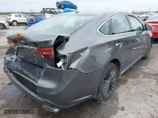 2016 Toyota Avalon Limited with VIN 4T1BK1EB6GU232328, listed as a IAAI auction lot 41318290 with 167,234 mi miles. Bid and sale history available at carsss.com. Image 4.