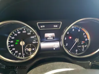 2014 Mercedes-Benz M 550 with VIN 4JGDA7DB8EA383850, listed as a Copart auction lot 79911164 with 107,090 mi miles and Salvage Title. Bid and sale history available at DreamBid. Image 9.