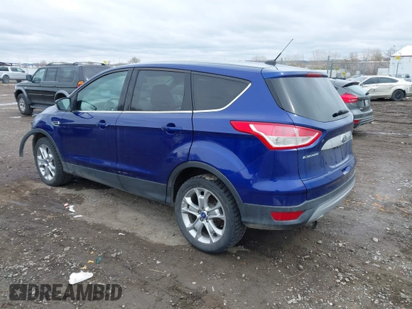 2013 Ford Escape SEL with VIN 1FMCU9H92DUA47288, listed as a IAAI auction lot 41912588 with 165,728 mi miles. Bid and sale history available at carsss.com. Image 3.