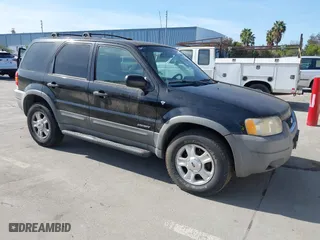2001 Ford Escape XLT with VIN 1FMCU03181KA15501, listed as a IAAI auction lot 41857955 with 157,344 mi miles. Bid and sale history available at carsss.com. Image 1.