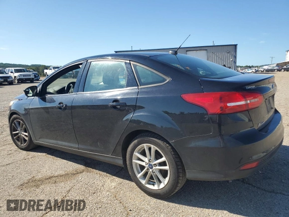 2017 Ford Focus SE with VIN 1FADP3F25HL265326, listed as a Copart auction lot 61384685 with 65,808 mi miles and Clean title. Bid and sale history available at DreamBid. Image 2.