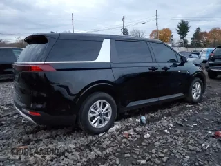 2023 Kia Carnival LX with VIN KNDNB4H32P6290920, listed as a Copart auction lot 82141794 with 28,597 mi miles and Salvage Title. Bid and sale history available at carsss.com. Image 3.