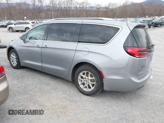 2021 Chrysler Pacifica Touring L with VIN 2C4RC1BG3MR542543, listed as a IAAI auction lot 41657073 with 118,833 mi miles and . Bid and sale history available at DreamBid. Image 3.