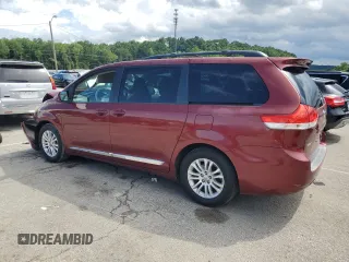 2012 Toyota Sienna XLE AAS with VIN 5TDYK3DC1CS233762, listed as a Copart auction lot 59224495 with 116,155 mi miles and Salvage title. Bid and sale history available at DreamBid. Image 2.
