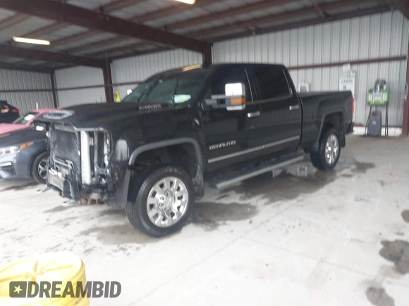 2017 GMC Sierra 2500HD Denali z VIN 1GT12UEY8HF222623, wystawiony jako IAAI lot #41985737 z przebiegiem 133 683 mil mil oraz . Historia ofert i sprzedaży dostępna na DreamBid. Obrazek 2.