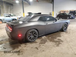 2017 Dodge Challenger R/T z VIN 2C3CDZBT3HH532092, wystawiony jako Copart lot #57772995 z przebiegiem 86 874 mil mil oraz Szkoda całkowita • Salvage title. Historia ofert i sprzedaży dostępna na DreamBid. Obrazek 3.