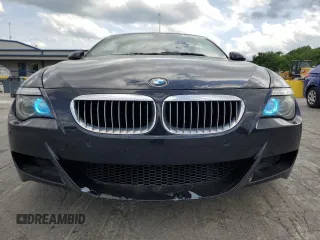 2009 BMW 6 Series M6 z VIN WBSEK93599CY80065, wystawiony jako Copart lot #55277505 z przebiegiem 125 557 mil mil oraz Tytuł czysty. Historia ofert i sprzedaży dostępna na DreamBid. Obrazek 5.