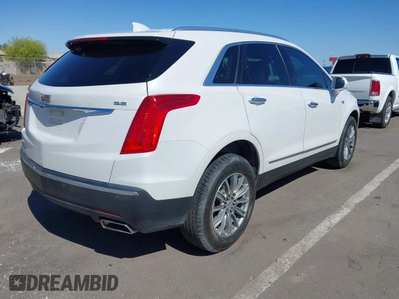 2017 Cadillac XT5 Luxury AWD z VIN 1GYKNDRS8HZ120863, wystawiony jako IAAI lot #42101279 z przebiegiem 100 535 mil mil oraz . Historia ofert i sprzedaży dostępna na DreamBid. Obrazek 4.