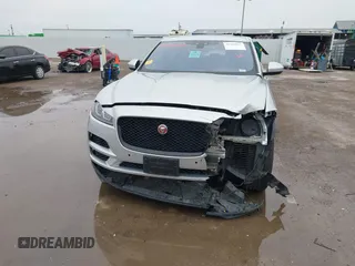 2020 Jaguar F-Pace 25t Premium z VIN SADCJ2FX2LA620720, wystawiony jako IAAI lot #41704850 z przebiegiem 57 113 mil mil oraz . Historia ofert i sprzedaży dostępna na DreamBid. Obrazek 13.